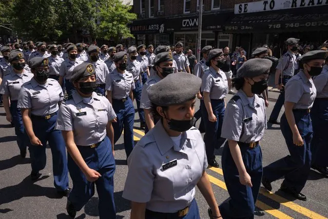 Participants march during the 155th Brooklyn's Memorial Day Parade in Brooklyn, New York, on May 30, 2022. (Photo by Yuki Iwamura/AFP Photo)