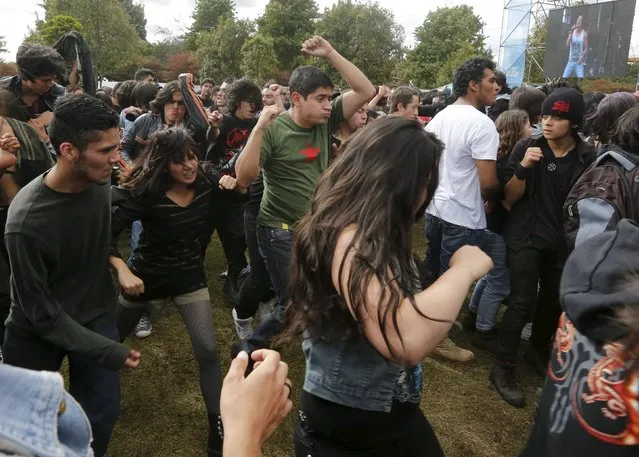People attend the Rock al Parque music festival in Bogota, Colombia August 15, 2015. (Photo by John Vizcaino/Reuters)