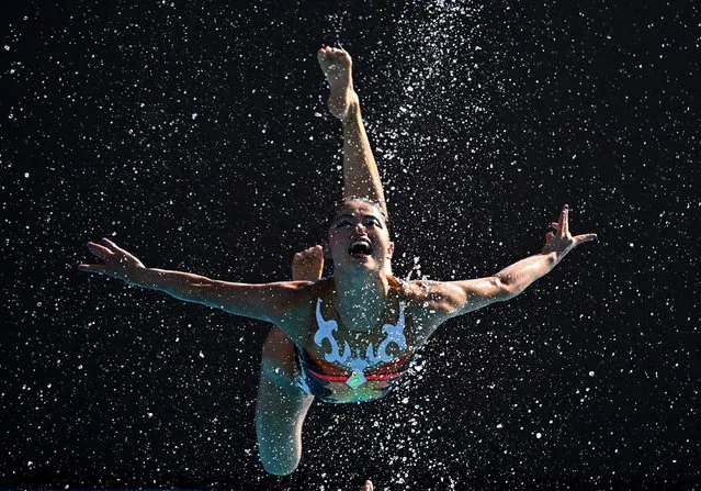A member of team Japan performs during the women's team free final at the FINA World Championships in Budapest, Hungary on June 24, 2022. (Photo by Marton Monus/Reuters)