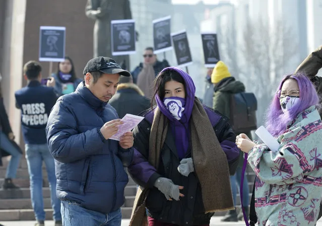 Activists of the Femen women's rights movement attend the celebration of the International Women's Day at Victory Square in Bishkek, Kyrgyzstan, Sunday, March 8, 2020. (Photo by Vladimir Voronin/AP Photo)