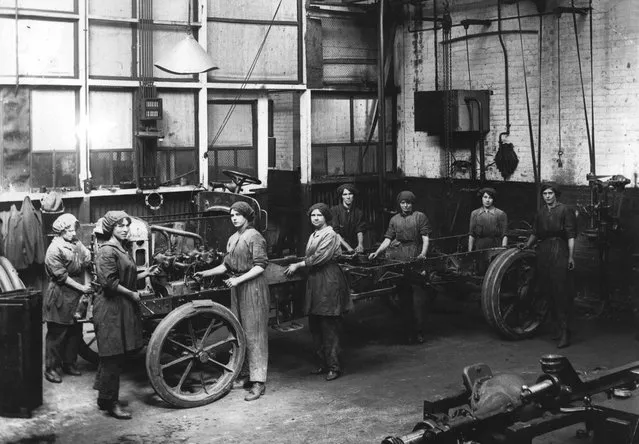 Women war workers working in an engineering shop, 1917.  (Photo by Hulton Archive)