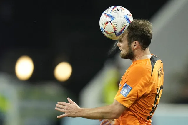 Daley Blind of the Netherlands goes for a header during the World Cup round of 16 soccer match between the Netherlands and the United States, at the Khalifa International Stadium in Doha, Qatar, Saturday, December 3, 2022. (Photo by Francisco Seco/AP Photo)