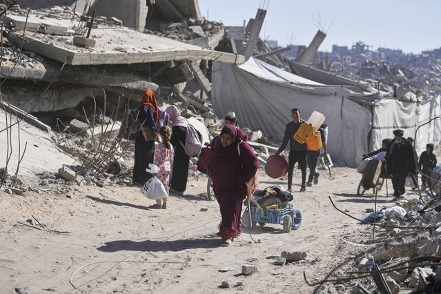 Displaced Palestinians fleeing Beit Lahia amid ongoing Israeli military operations in the Gaza Strip arrive in Jabalia, northern Gaza, on Friday, May 16, 2025. (Photo by Jehad Alshrafi/AP Photo)