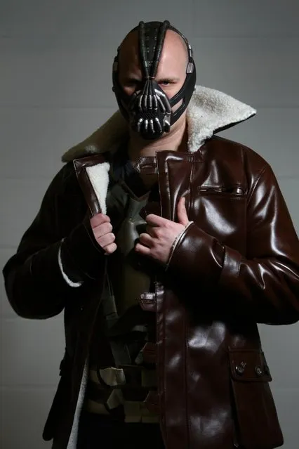 An actor dressed as Bane from the film Batman poses for a photo at the London Super Comic Convention at the ExCeL Centre on February 23, 2013 in London, England. Enthusiasts at the Comic Convention are encouraged to wear a costume of their favourite comic character and flock to the ExCeL to gather all the latest news in the world of comics, manga, anime, film, cosplay, games and cult fiction. (Photo by Jordan Mansfield)