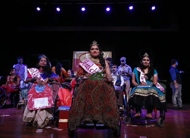 Rajalakshmi (C), 28, smiles after winning the Miss Wheelchair India beauty pageant in Mumbai November 26, 2014. (Photo by Danish Siddiqui/Reuters)