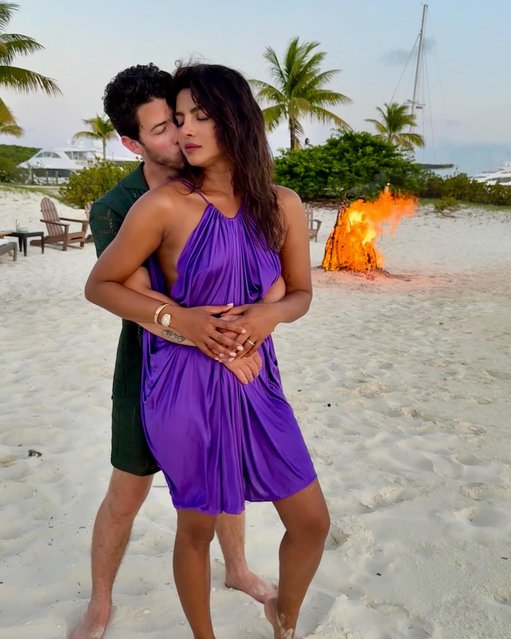 American singer Nick Jonas and India's highest-paid actress  Priyanka Chopra share sweet PDA at the beach on her birthday on July 20, 2025. (Photo by nickjonas/Instagram)