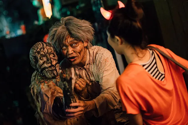 People attend a Halloween event at Ocean Park on October 30, 2015 in Hong Kong. Halloween - a named taken from 'All Hallows' Even' falls on the day before All Saints' Day on November 1 - a holiday when Christians remember their deceased loved ones. (Photo by Anthony Kwan/Getty Images)