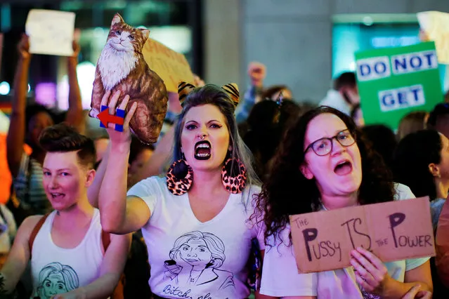Women protest against Republican presidential nominee Donald Trump and the GOP in front of Trump Tower in Manhattan, New York City, U.S., October 19, 2016. (Photo by Brendan McDermid/Reuters)