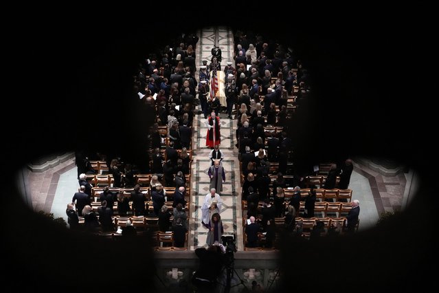 A casket containing the remains of former Vice President Dick Cheney is carried out of the National Cathedral in Washington, DC, during his funeral on Thursday, November 20, 2025. Cheney, who died November 3 at the age of 84, received full military honors at the invitation-only memorial service. Former Presidents Joe Biden and George W. Bush were in attendance, as were former Vice Presidents Kamala Harris, Mike Pence, Al Gore and Dan Quayle. (Photo by Andrew Harnik/Getty Images)