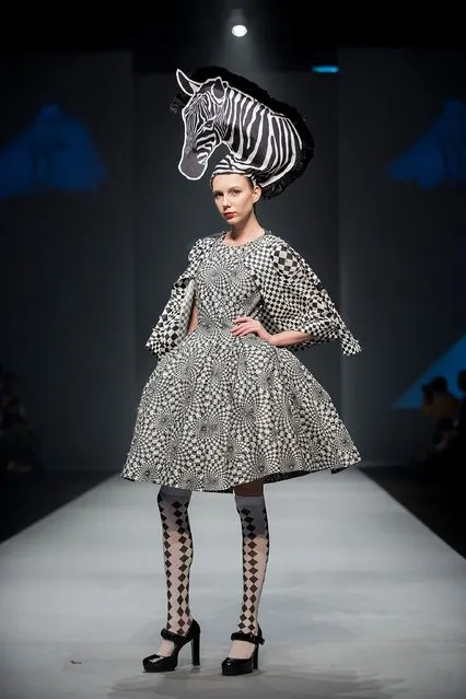 A model showcases designs by Andy Ho on the runway during the Brand Collections' Show on day 1 of Hong Kong Fashion Week Fall/Winter 2015 at the Hong Kong Convention and Exhibition Centre on January 19, 2015 in Hong Kong. (Photo by Anthony Kwan/Getty Images)