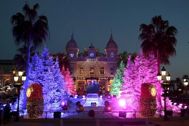 Christmas trees frame the Monte Carlo Casino as part of holiday season decorations in Monaco, December 10, 2015. (Photo by Eric Gaillard/Reuters)