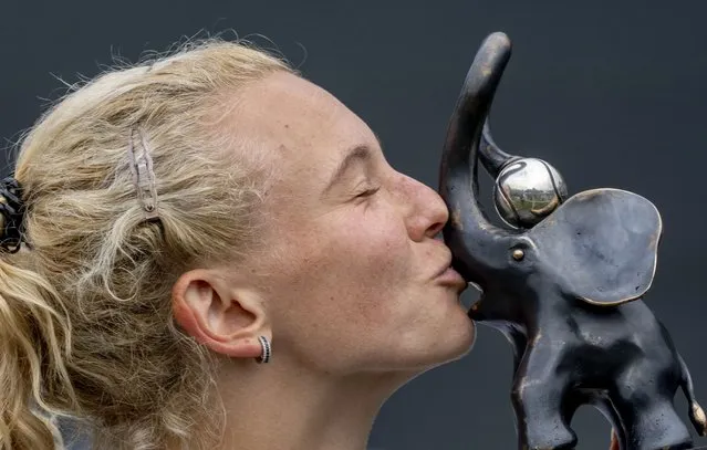 Czech Republic's Katerina Siniakova kisses the trophy after winning the WTA tennis final against Italy's Lucia Bronzetti in Bad Homburg, Germany, Saturday, July 1, 2023. (Photo by Michael Probst/AP Photo)