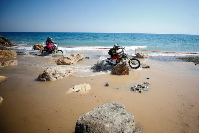 Motorcyclists ride during the 9th Sea To Sky Enduro Races – Qualifying Lap at Kındılçeşme Beach of Antalya's Kemer district, Turkey on September 26, 2018. (Photo by Mustafa Ciftci/Anadolu Agency/Getty Images)