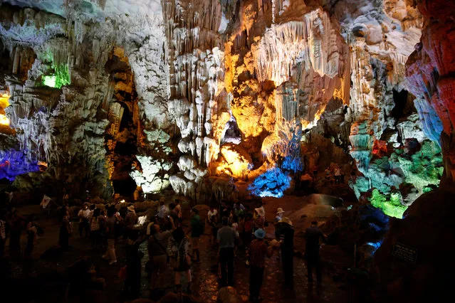 Chinese tourists are seen inside a cave of Unesco's world heritage Ha Long bay, Vietnam August 12, 2017. (Photo by Reuters/Kham)