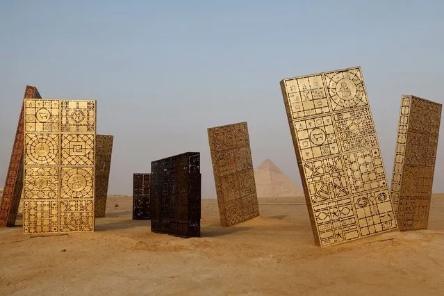 The art installation “Reality is Timeless” by Bahraini artist Rashid al-Khalifa is pictured during the third edition of the “Forever is Now” art exhibition by Art d’Egypte at the Giza pyramids necropolis on October 28, 2023. (Photo by Khaled Desouki/AFP Photo)