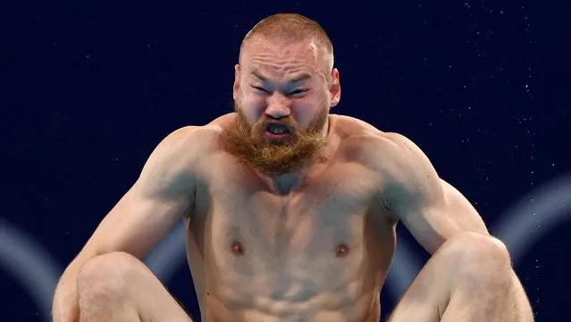 Evgenii Kuznetsov of ROC competes in the semi final of the Men's 3m Springboard on day eleven of the Tokyo 2020 Olympic Games at Tokyo Aquatics Centre on August 03, 2021 in Tokyo, Japan. (Photo by Antonio Bronic/Reuters)