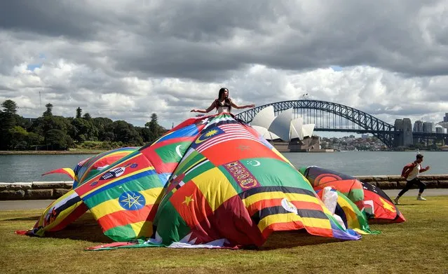 Actress Susie Wrong models the Amsterdam Rainbow Dress at the Royal Botanic Garden, ahead of the Sydney WorldPride Human Rights Conference, in Sydney on Tuesday, September 20, 2022. (Photo by Bianca De Marchi/AAP Image)