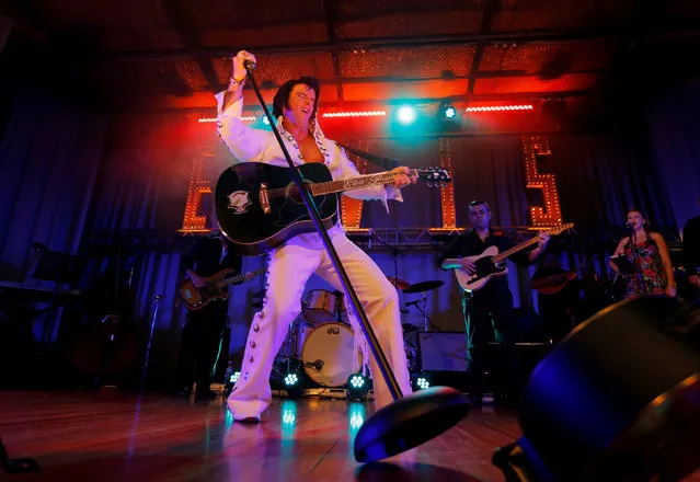 Elvis Presley tribute artist Stephen Fletcher performs in a singing contest at the 25th annual Parkes Elvis Festival in the rural Australian town of Parkes, west of Sydney, Australia January 13, 2017. (Photo by Jason Reed/Reuters)