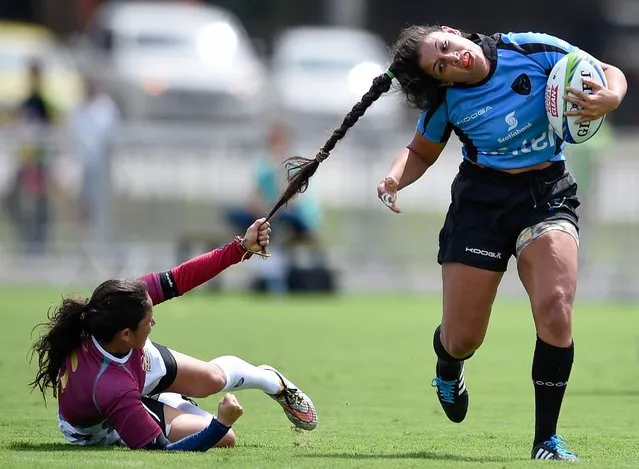 Maryoly Gamez of Venezuela battles for the ball against Victoria Rios of Uruguay during the International Women's Rugby Test Event for the Rio 2016 Olympics at Deodoro Olympic Park, March 6, 2016, in Rio de Janeiro. (Photo by Buda Mendes/Getty Images)