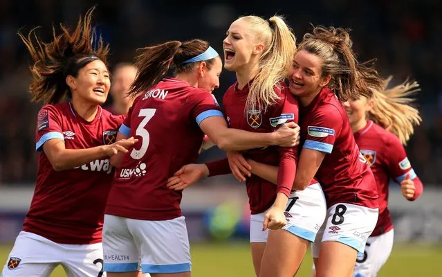 Alisha Lehmann of West Ham Ladies celebrates scoring her sides first goal with her team mates during the Women's FA Cup Semi Final match between Reading Women and West Ham United Ladies at Adams Park on April 14, 2019 in High Wycombe, England. (Photo by James Chance/Getty Images)