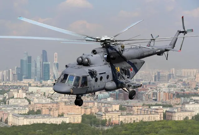 Mil Mi-8 combat helicopter flies over Moscow, Russia on May 7, 2019 during the dress rehearsal of a Victory Day air show marking the 74th anniversary of the victory over Nazi Germany in the 1941-1945 Great Patriotic War, the Eastern Front of World War II. (Photo by Sergei Savostyanov/TASS)