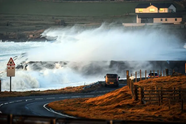 Waves break over the end of the runway at Sumburgh Airport in Sumburgh, Shetland Islands, on January 31, 2024, as severe weather from Storm Ingunn affects flights and ferry travel. (Photo by Andy Buchanan/AFP Photo)