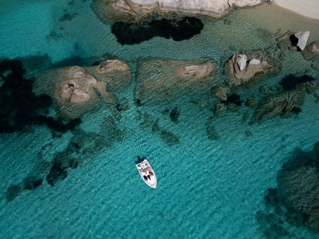 An aerial view of a beach in Porto Cervo, Costa Smeralda, already crowded with tourists during these first hot weekends of spring, with temperatures above 25 degrees on April 14, 2024 in Porto Cervo, Italy. (Photo by Emanuele Perrone/Getty Images)