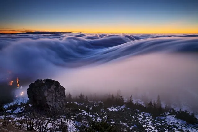 Fog is seen over over the Jested mountains, Czech, Republic in January 2017. (Photo by Martin Rak/Solent News/Rex Features/Shutterstock)