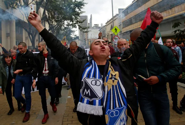 Demonstrators shouts slogans during May Day protests in Bogota, Colombia, May 1, 2016. (Photo by John Vizcaino/Reuters)
