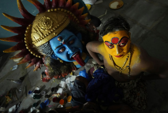 An artist dresses up to perform during a procession marking “Bonalu” festival in Hyderabad, India, Monday, July 29, 2024. (Photo by Mahesh Kumar A./AP Photo)