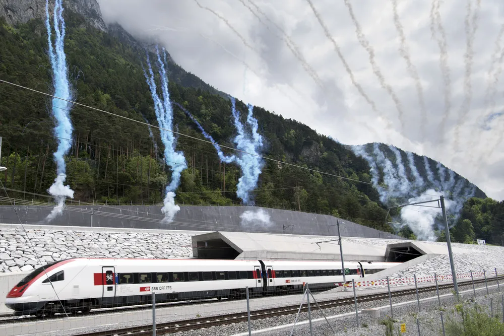 Bizarre Stage Show Opens 35-Mile Rail Tunnel under Swiss Alps