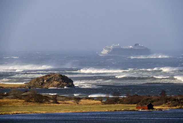 The cruise ship Viking Sky as it drifts after sending a Mayday signal because of engine failure in windy conditions near Hustadvika, off the west coast of Norway, Saturday March 23, 2019.  The Viking Sky is forced to evacuate its estimated 1,300 passengers. (Photo by Odd Roar Lange/NTB Scanpix via AP Photo)