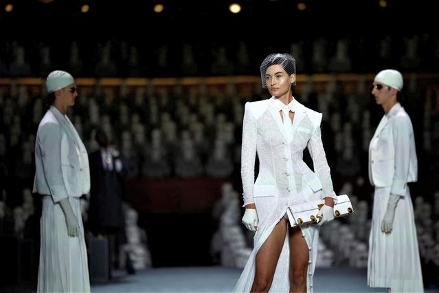 Models present creations by designer Thom Browne as part of his Haute Couture Fall/Winter 2023-2024 collection show at the Opera Garnier in Paris, France on July 3, 2023. (Photo by Sarah Meyssonnier/Reuters)