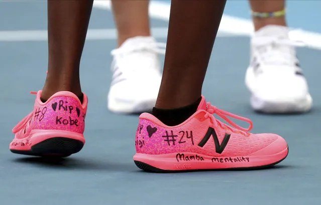 United States' Coco Gauff, front, and compatriot Caty McNally wear a tribute to Kobe Bryant on their shoes during their doubles match against Japan's Shuko Aoyama amd Ena Shibahara at the Australian Open tennis championship in Melbourne, Australia, Monday, January 27, 2020. (Photo by Dita Alangkara/AP Photo)