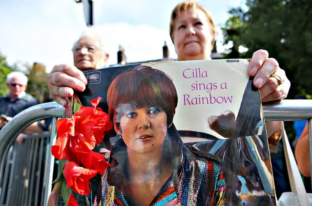 Members of the public arrive outside St Mary's Catholic Church on August 20, 2015 in Liverpool, England. Singer and TV host Cilla Black died on the 1st August at her home in Spain after a head injury caused by a fall. She is best known for a number of hits in the 1960's and went on to be one of TV's highest earning stars with shows including Blind Date and Surprise Surprise regularly being watched by millions of viewers. (Photo by Dave Thompson/Getty Images)