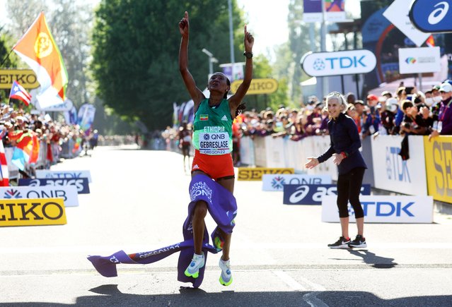 Gold medalist Gotytom Gebreslase of Team Ethiopia crosses the finish line after the Women's Marathon Final on day four of the World Athletics Championships Oregon22 at Hayward Field on July 18, 2022 in Eugene, Oregon. (Photo by Mike Segar/Reuters)