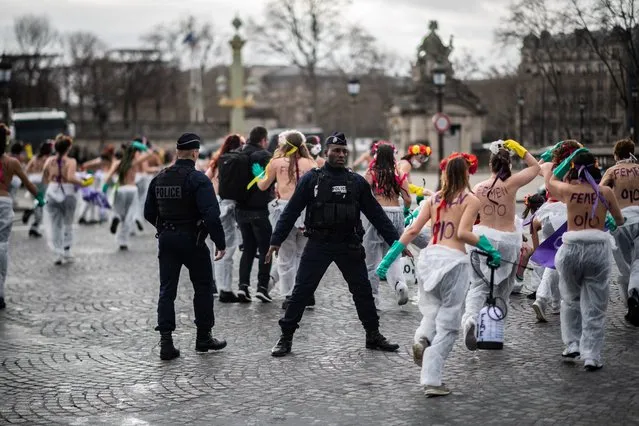 Femen activists demonstrate at place de la Concorde in Paris, on March 8, 2020, to call for gender equality on the International Women's day. (Photo by Martin Bureau/AFP Photo)