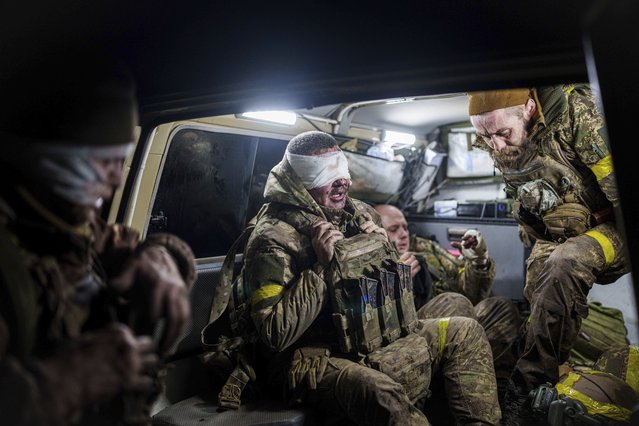 Injured Ukrainian servicemen arrive from the battlefield at Medical Service “Ulf” of the 108th Separate Battalion “Da Vinci Wolves” on Pokrovsk direction, Ukraine, December 23, 2024. (Photo by Evgeniy Maloletka/AP Photo)
