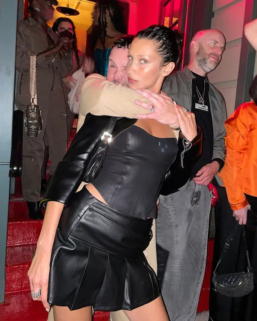 American model Bella Hadid wears a leather corset and mini skirt while celebrating designer Kim Jones' birthday on September 9, 2022 in New York City. (Photo by bellahadid/Instagram)