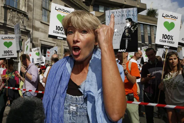 Actress Emma Thompson speaks to the media at the start of the “People's Climate March” in central London September 21, 2014. (Photo by Luke MacGregor/Reuters)