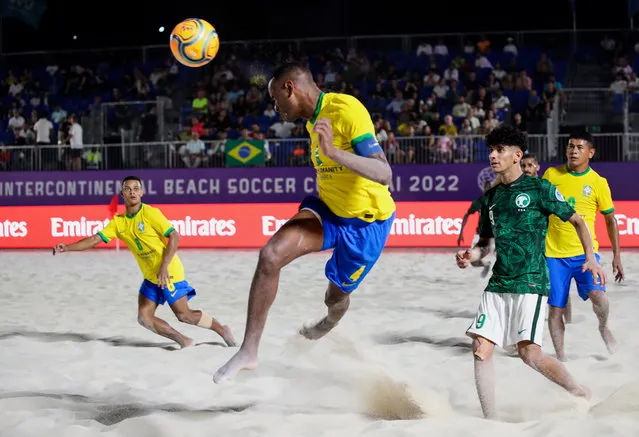 Catarino (Front) of Brazil in action during the Emirates Intercontinental Beach Soccer Cup 2022 group A match between Saudi Arabia and Brazil, in Gulf emirate of Dubai, United Arab Emirates, 01 November 2022. (Photo by Ali Haider/EPA/EFE)