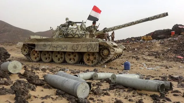 A soldier loyal to Yemen's government rides on a tank in the frontline province of Marib, September 19, 2015. (Photo by Reuters/Stringer)