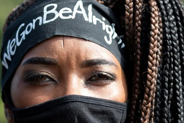 A protester marches for justice system reform and equity in education in Portland, Oregon, U.S., August 1, 2020. (Photo by Caitlin Ochs/Reuters)