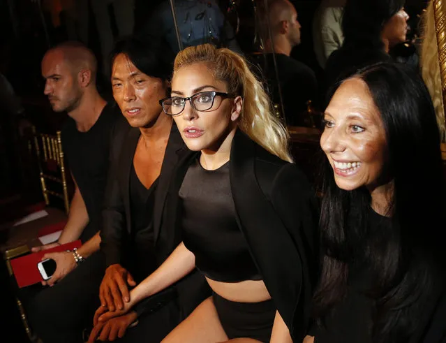 Lady Gaga, second from right, poses for pictures before the Brandon Maxwell Spring 2017 collection is modeled during Fashion Week at the Russian Tea Room in New York, Tuesday, September 13, 2016. (Photo by Seth Wenig/AP Photo)
