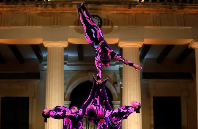 Acrobats of the Puyang Acrobatics Troupe from Henan Province in China perform in Valletta, Malta, September 17, 2016. (Photo by Darrin Zammit Lupi/Reuters)