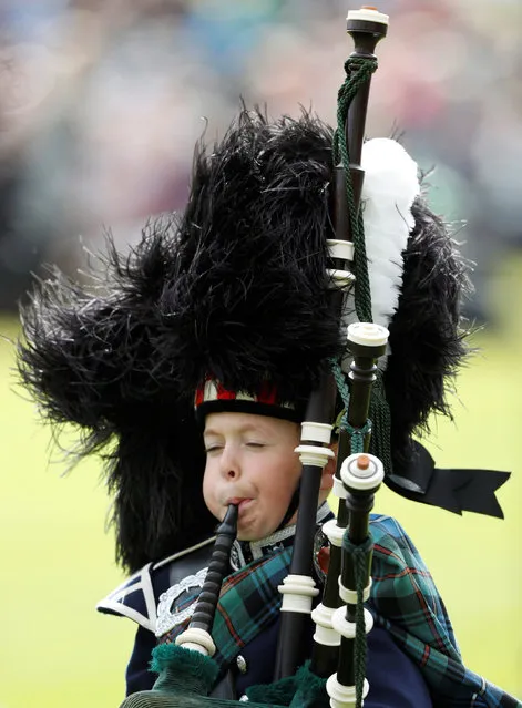 A young piper takes part at the annual Braemar Highland Gathering in Braemar, Scotland, Britain September 3, 2016. (Photo by Russell Cheyne/Reuters)