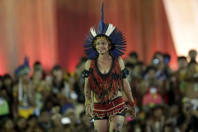 An indigenous woman participates in a parade called "International Indigenous Beauty" during the first World Games for Indigenous Peoples in Palmas, Brazil, October 24, 2015. (Photo by Ueslei Marcelino/Reuters)