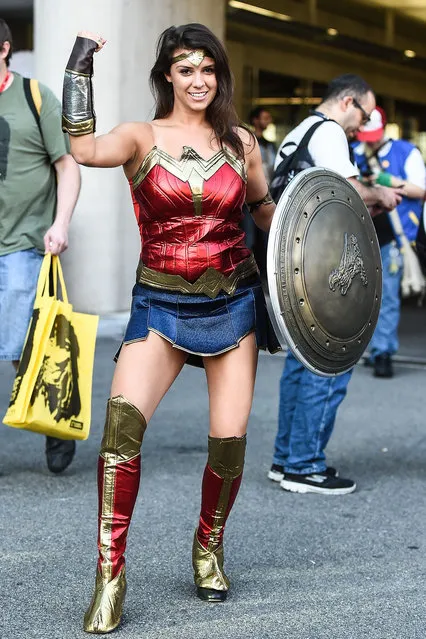 A Comic Con attendee poses as Wonderwoman during 2016 New York Comic Con – Day 1 on October 6, 2016 in New York City. (Photo by Daniel Zuchnik/Getty Images)