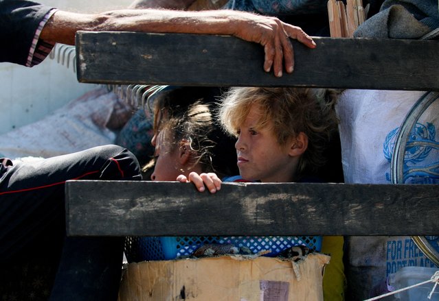Displaced Palestinians, fleeing northern Gaza due to an Israeli military operation, move southward, on September 16, 2025. (Photo by Mahmoud Issa/Reuters)