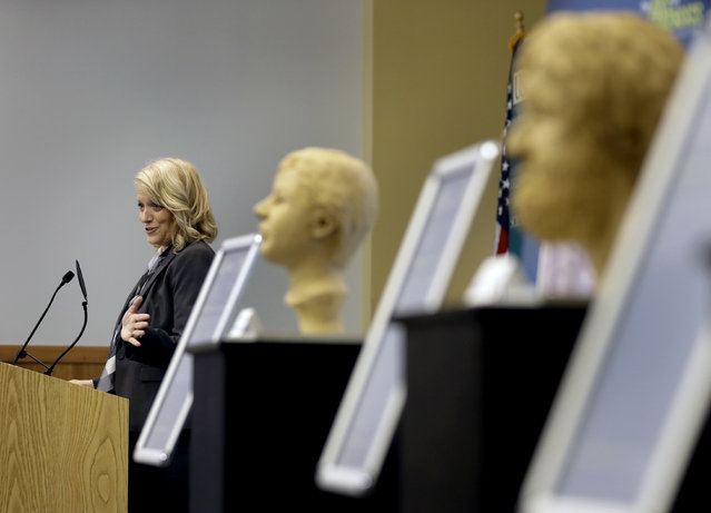 Dr. Erin Kimmerle, associate professor n the Department of Anthropology at the University of South Florida, gestures as she speaks to the members of the Art of Forensics conference Friday, October 21, 2016, in Tampa, Fla. Kimmerle, and several forensic artists, have been working with law enforcement officials on cold cases in Florida to help give victims a face in hopes family members may recognize them. (Photo by Chris O'Meara/AP Photo)